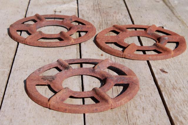 photo of antique stove burners, rusty crusty vintage junk yard primitive industrial wall art decor #6