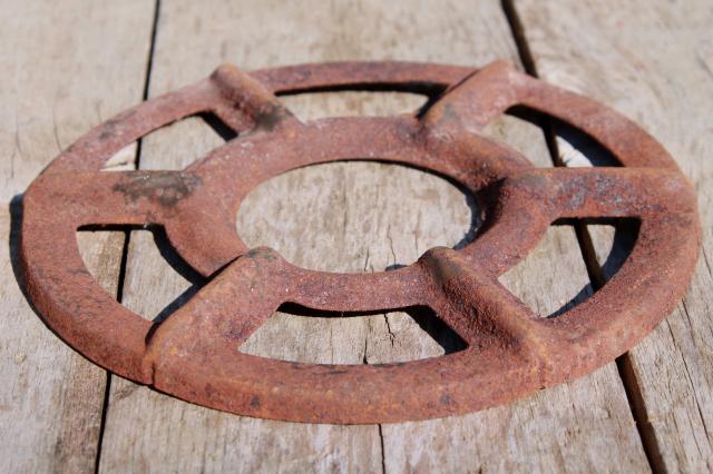 photo of antique stove burners, rusty crusty vintage junk yard primitive industrial wall art decor #7