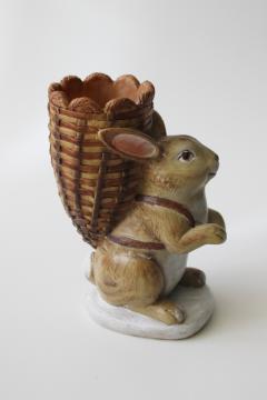 catalog photo of antique style resin Easter bunny w/ basket on his back, candy container or candle holder