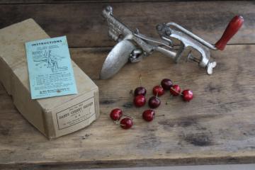 catalog photo of antique style vintage Standard metal cherry pitter, old box from White Mountain