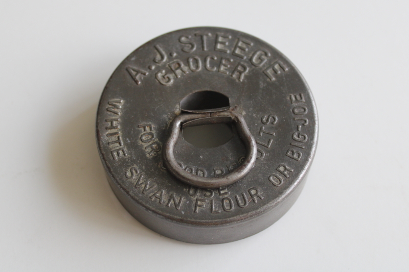 photo of antique tin biscuit cutter, old embossed advertising White Swan flour A J Steege grocer  #1