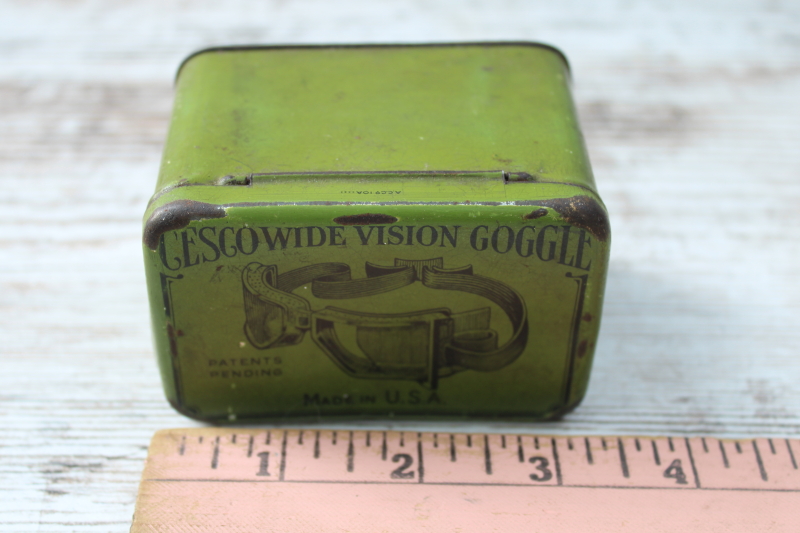 photo of antique tin for steampunk style auto or motorcycle goggles, 1920s vintage graphics print on green metal  #2