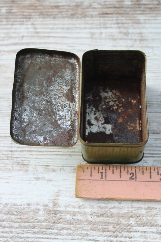 photo of antique tin for steampunk style auto or motorcycle goggles, 1920s vintage graphics print on green metal  #5