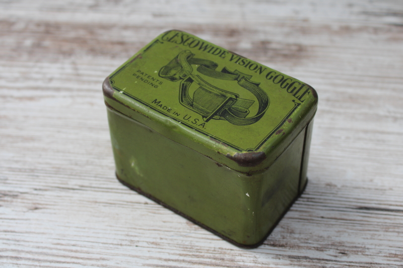 photo of antique tin for steampunk style auto or motorcycle goggles, 1920s vintage graphics print on green metal  #6