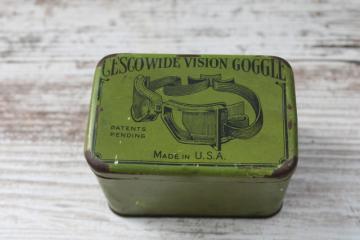 catalog photo of antique tin for steampunk style auto or motorcycle goggles, 1920s vintage graphics print on green metal 