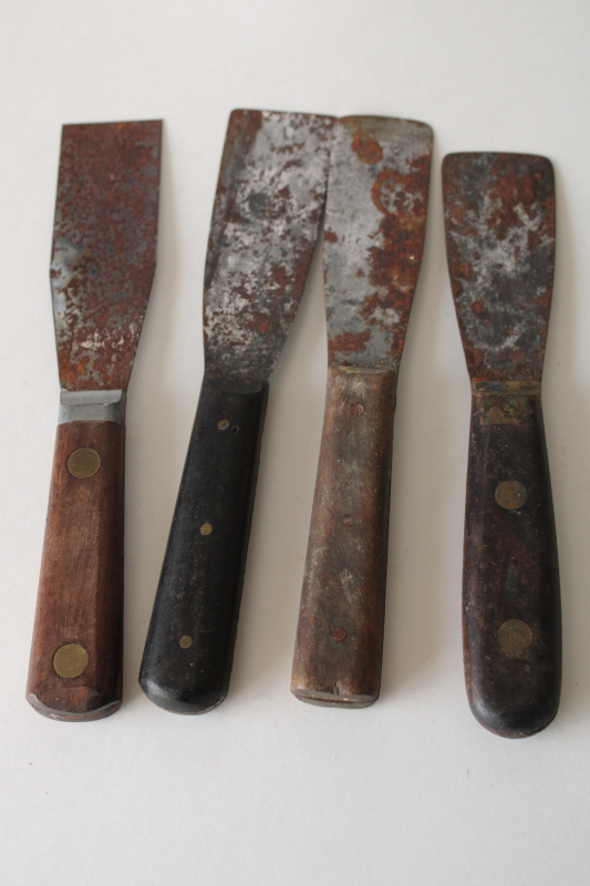 photo of antique tools for plaster or window glazing, wood handled putty knives, spreaders or scrapers  #2