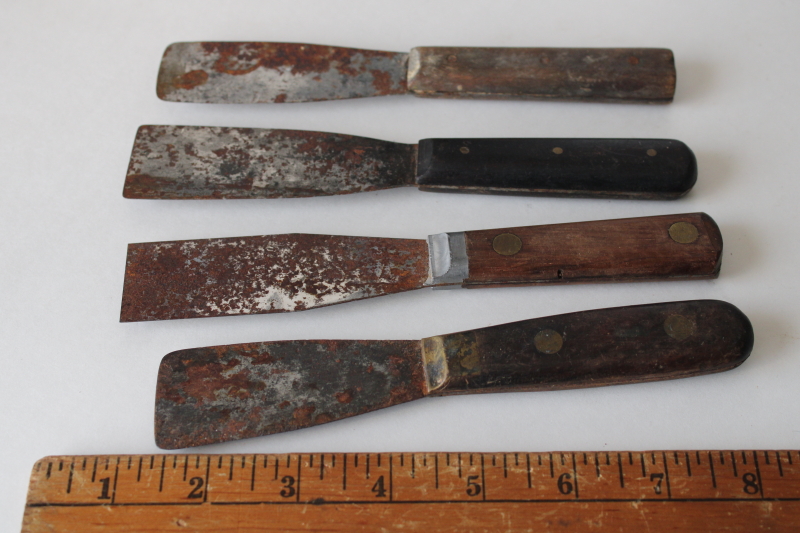 photo of antique tools for plaster or window glazing, wood handled putty knives, spreaders or scrapers  #3