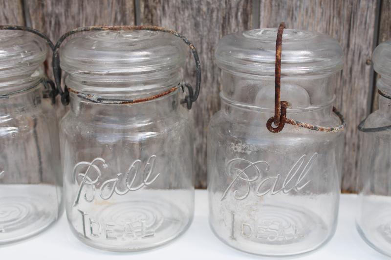 photo of antique vintage Ball Ideal Mason clear glass jars w/ wire bail lightning lids #3