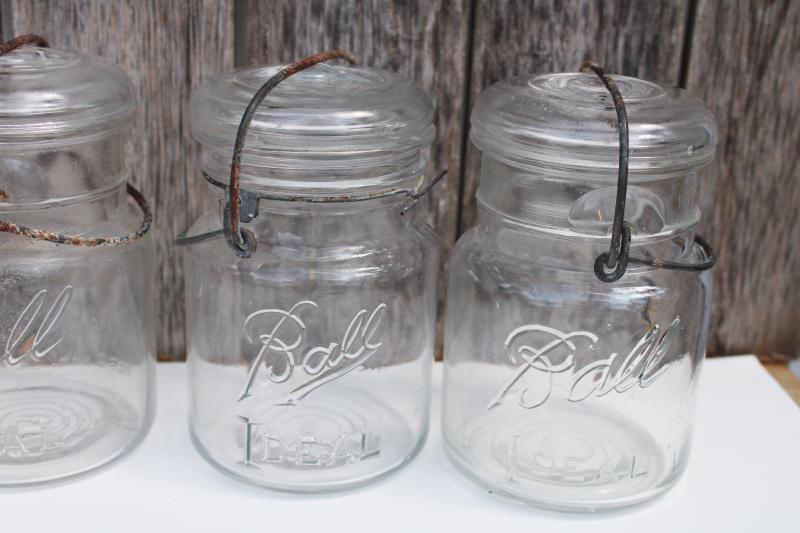 photo of antique vintage Ball Ideal Mason clear glass jars w/ wire bail lightning lids #4