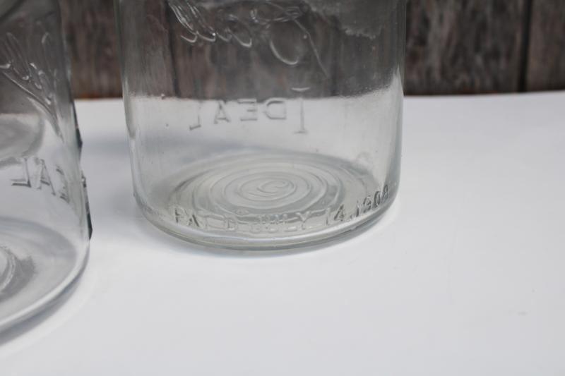 photo of antique vintage Ball Ideal Mason clear glass jars w/ wire bail lightning lids #6