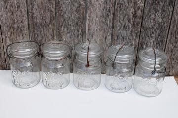 catalog photo of antique vintage Ball Ideal Mason clear glass jars w/ wire bail lightning lids