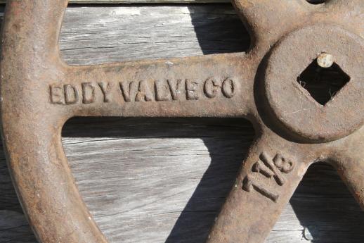 photo of antique vintage Eddy fire hydrant valve handle, large industrial cast iron hand wheel #2