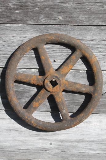 photo of antique vintage Eddy fire hydrant valve handle, large industrial cast iron hand wheel #5