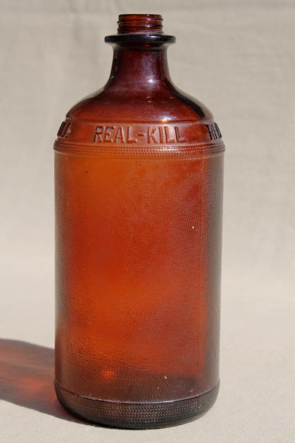 photo of antique vintage amber glass poison bottle, Real Kill embossed quart jar #1