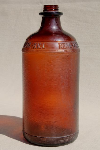 photo of antique vintage amber glass poison bottle, Real Kill embossed quart jar #4