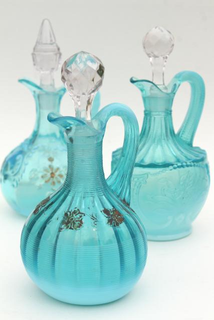 photo of antique vintage blue opalescent glass cruet bottles, aqua colored glass #1