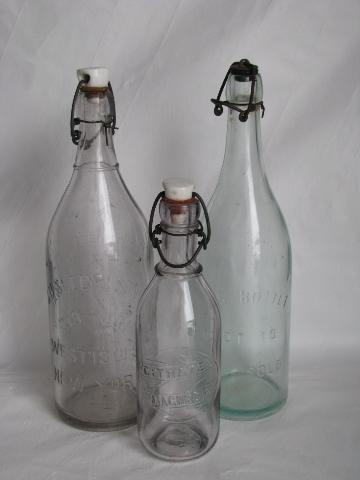 photo of antique vintage bottle lot, porcelain / wire bail lid bottles w/ old advertising #1