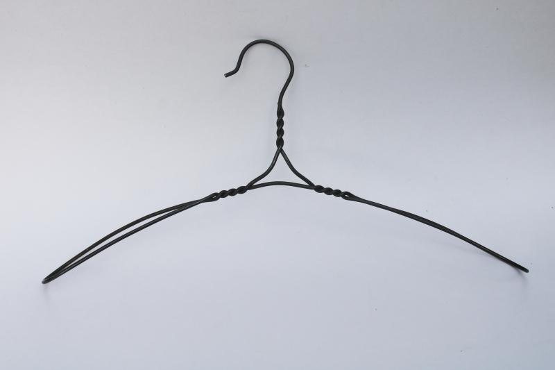 photo of antique vintage clothes hanger heavy twisted wire, wide shoulder shape #1