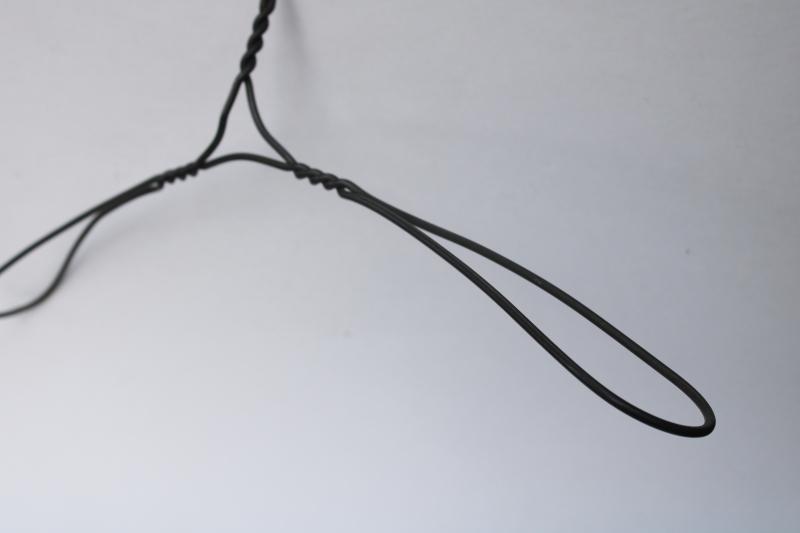 photo of antique vintage clothes hanger heavy twisted wire, wide shoulder shape #2