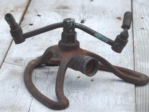 photo of antique vintage copper lawn sprinkler w/ art deco cast iron stand #1