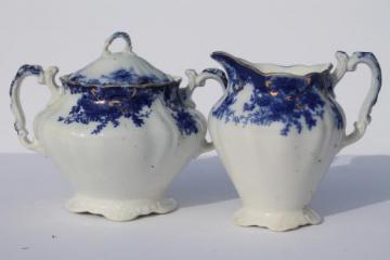 catalog photo of antique vintage flow blue china serving pieces, cream pitcher & sugar bowl set