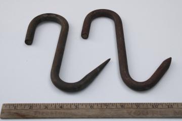 catalog photo of antique vintage forged iron meat hanging hooks, huge metal hooks for smokehouse or butcher