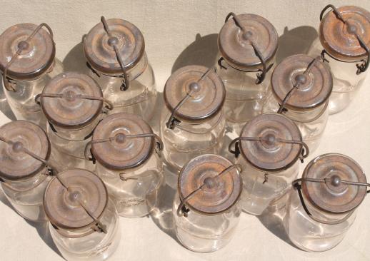 photo of antique vintage glass bottles, half pint glass fruit preserves jars w/ metal lids #2
