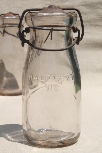 photo of antique vintage glass bottles, half pint glass fruit preserves jars w/ metal lids #3