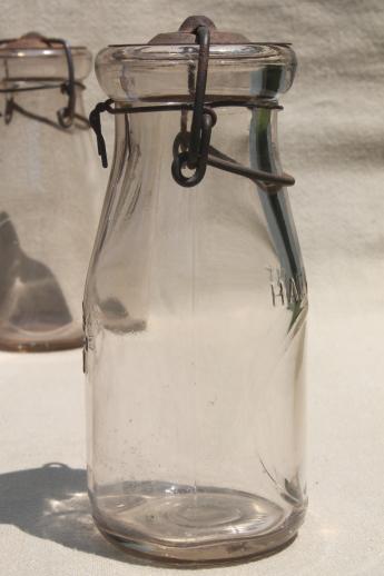 photo of antique vintage glass bottles, half pint glass fruit preserves jars w/ metal lids #4