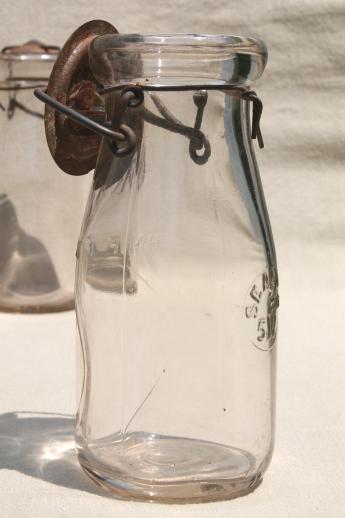 photo of antique vintage glass bottles, half pint glass fruit preserves jars w/ metal lids #7