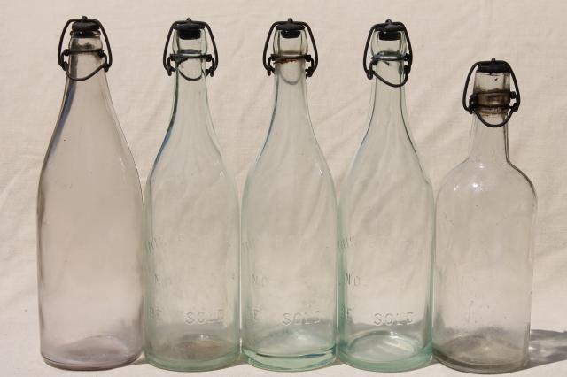 photo of antique & vintage glass bottles w/ wire bail lids, old embossed glass wine bottles #3