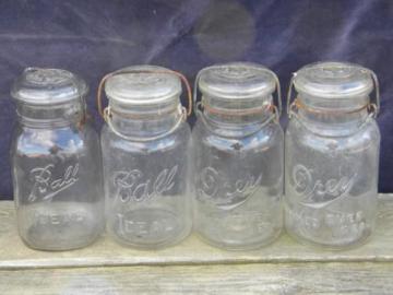 catalog photo of antique vintage glass fruit jars lot, old lightning bail lids w/ glass covers