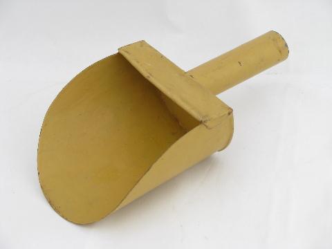 photo of antique vintage kitchen flour bin scoop or sugar shovel, primitive old yellow paint #1