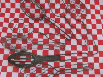 catalog photo of antique vintage kitchen utensils, flat wirework whip spoons & whisks