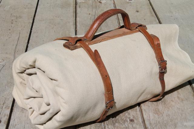 photo of antique vintage traveling bag satchel books or blanket roll carrier, leather handle & straps #1