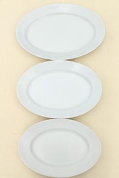 catalog photo of antique vintage white ironstone china platters, platter stack graduated large small