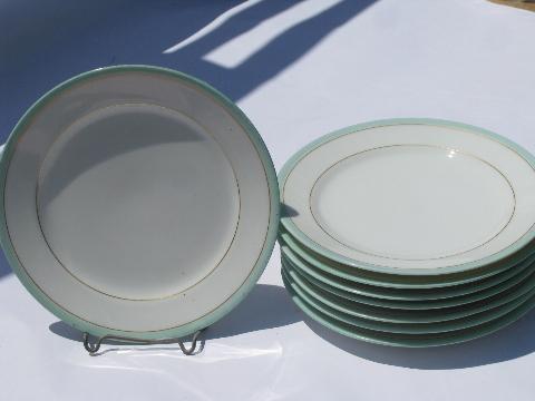 photo of antique vintage white porcelain china plates, pale green painted band border #1