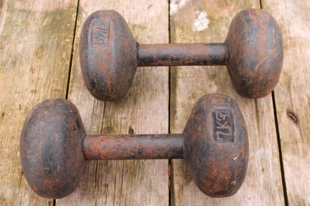 photo of antique weight lifting weights, pair of iron dumbbells, early 1900s vintage sporting equipment #3