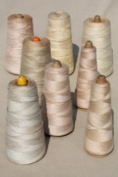 catalog photo of antique white & cream colors primitive grubby old spools of vintage cotton cord thread