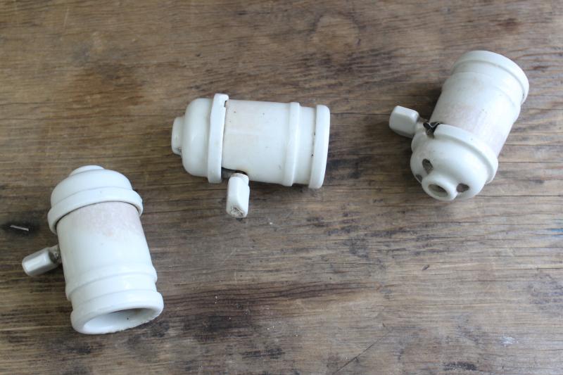 photo of antique white ironstone industrial electric light bulb sockets w/ turn key paddle switches #1