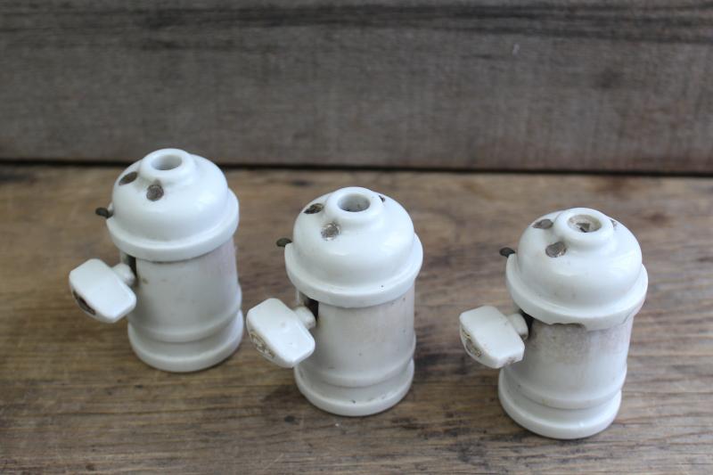 photo of antique white ironstone industrial electric light bulb sockets w/ turn key paddle switches #2