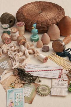 catalog photo of antique wicker sewing basket full of vintage notions, thread spools, sock darners etc.