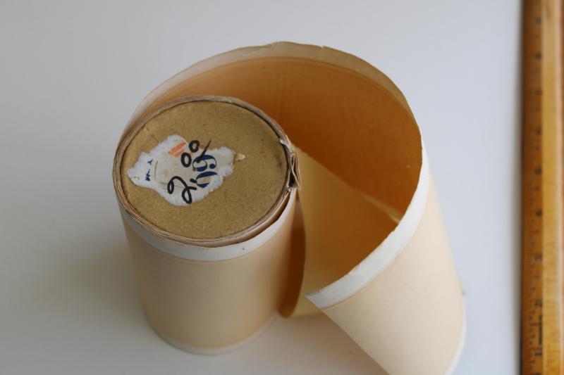 photo of antique wide silk ribbon for display, rolls of millinery trim in original paper #8