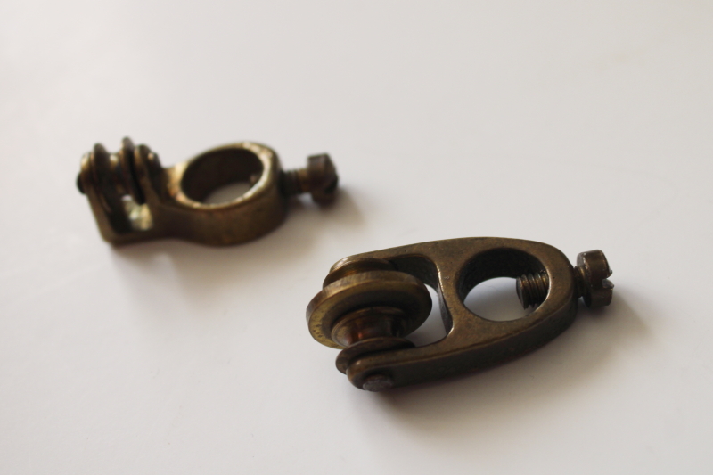 photo of antique window curtain hardware, tiny solid brass pulleys to draw panel sideways w/ downward pull  #2
