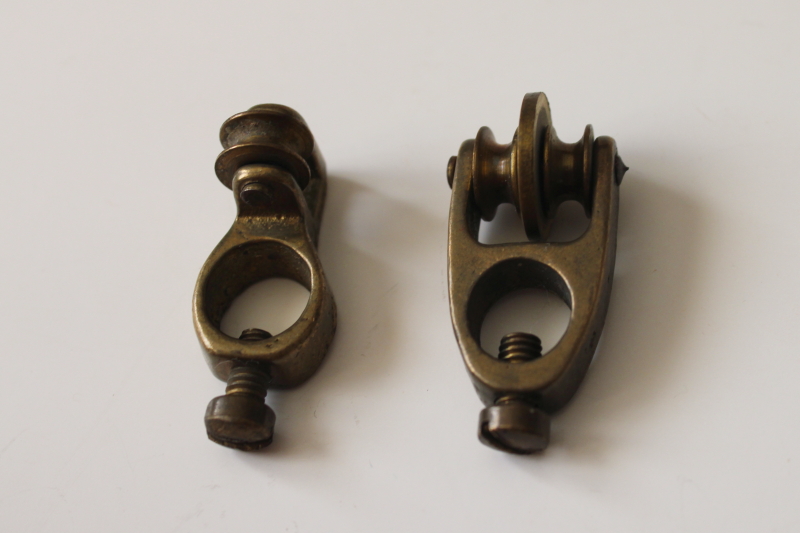 photo of antique window curtain hardware, tiny solid brass pulleys to draw panel sideways w/ downward pull  #3