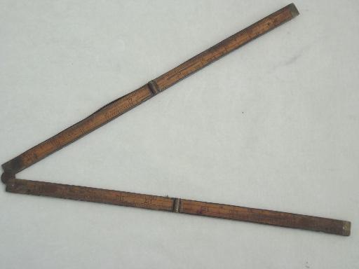photo of antique wood measures, brass bound folding scales, old advertising tool rulers #7
