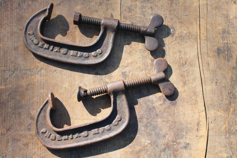photo of antique woodworking shop tools, vintage iron c - clamps embossed Phoenix Mfg Co #1