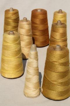 catalog photo of antique yellow golds shades of gold primitive grubby old spools of vintage cotton cord thread