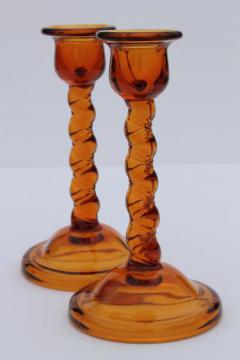 catalog photo of art deco vintage amber glass candle holders, tall barley twist candlesticks