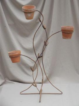 catalog photo of art deco vintage wrought iron plant stand, flower pot holder for balcony garden